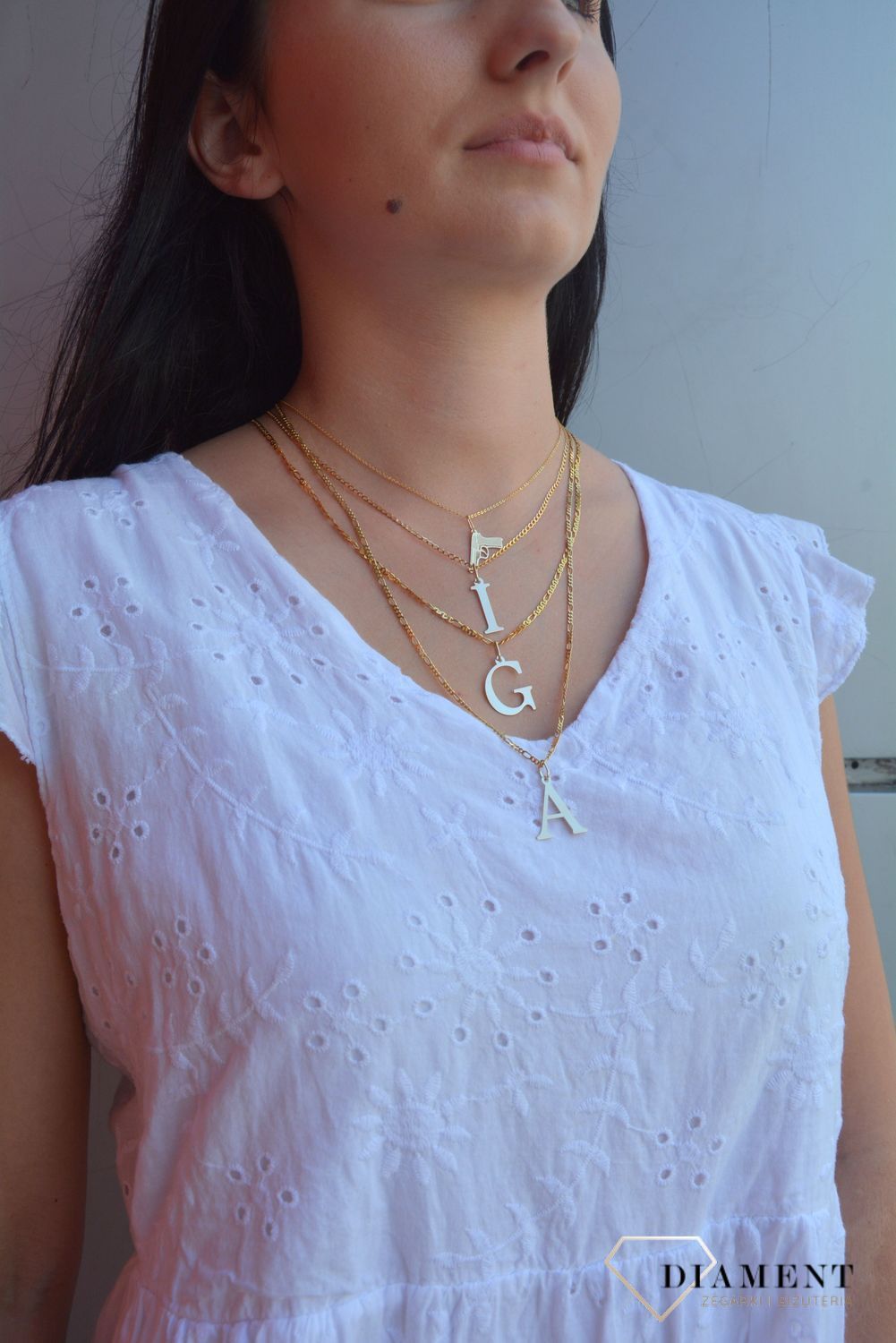 Zawieszka w kształcie litery C, wykonana z najwyższej jakości złota próby 585.jpg